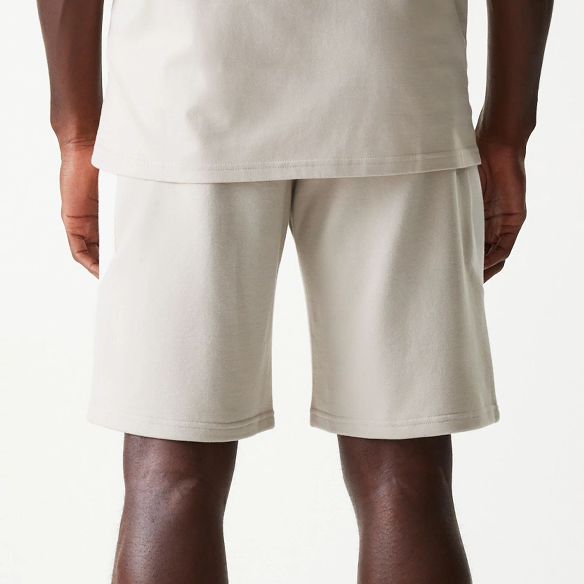 The Male model is wearing New York Yankees MLB Raglan Cream Shorts 6