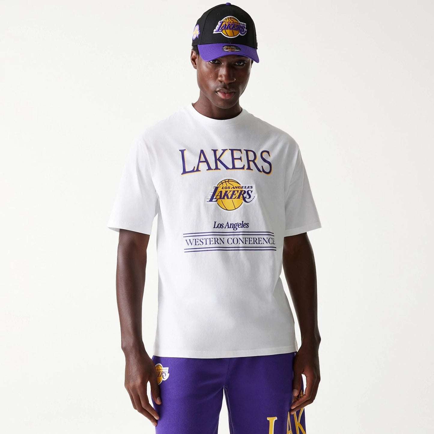 The Male model is wearing LA Lakers NBA Team Graphic White Oversized T-Shirt 3