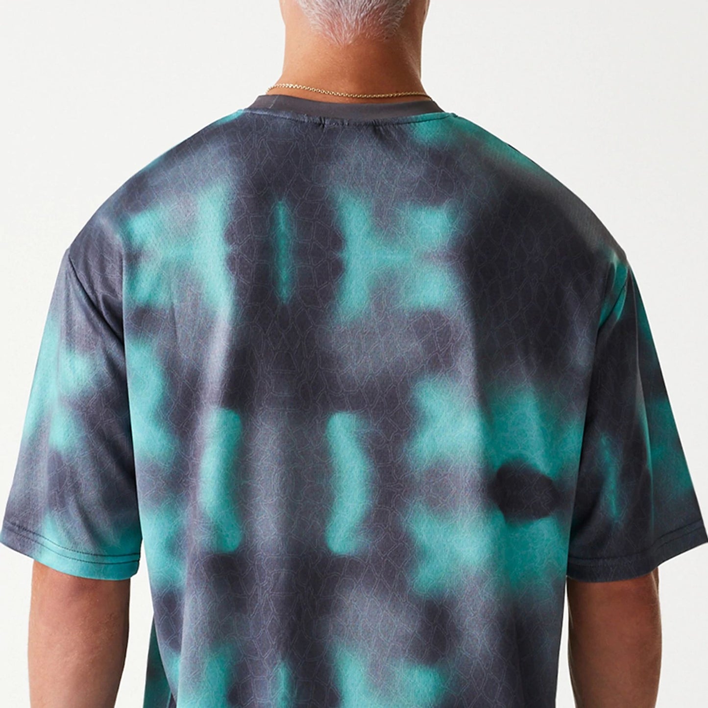 The Male model is wearing Chicago Bulls NBA All Over Print Green Oversized T-Shirt 5