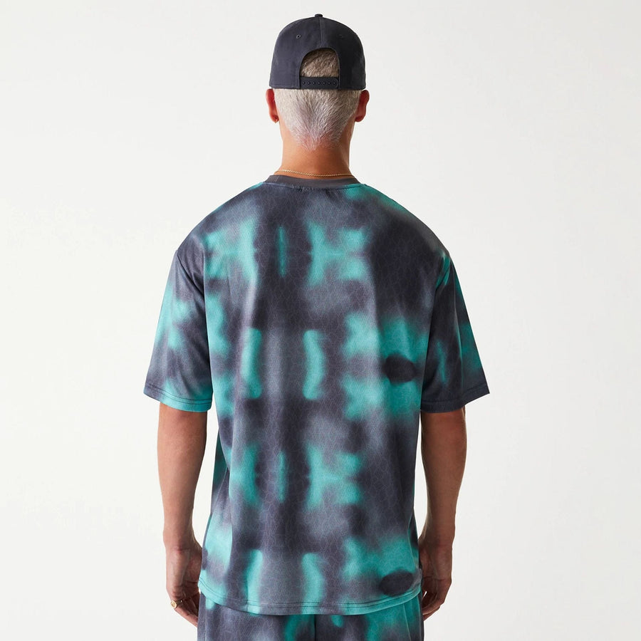 The Male model is wearing Chicago Bulls NBA All Over Print Green Oversized T-Shirt 2