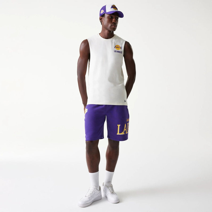 The Male model is wearing LA Lakers NBA Team Graphic Purple Shorts 8