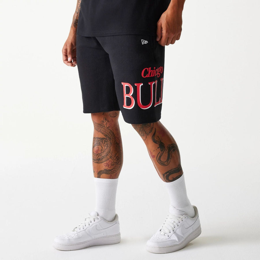 The Male model is wearing Chicago Bulls NBA Team Graphic Black Shorts 4