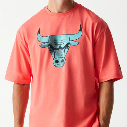 The Male model is wearing Chicago Bulls NBA All Over Print Infill Pink Oversized T-Shirt 3