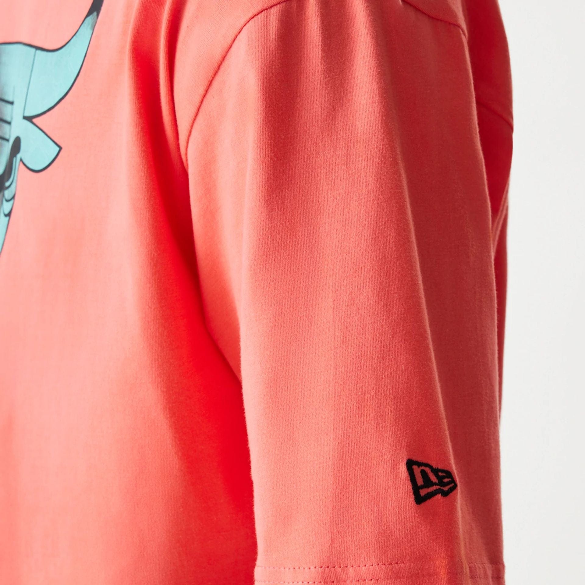 The Male model is wearing Chicago Bulls NBA All Over Print Infill Pink Oversized T-Shirt 5