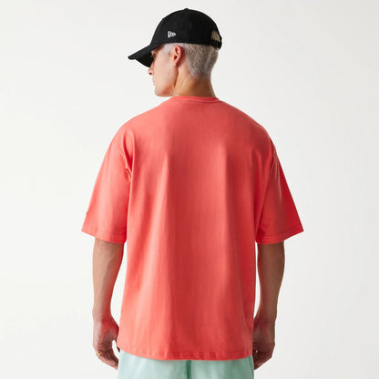 The Male model is wearing Chicago Bulls NBA All Over Print Infill Pink Oversized T-Shirt 2