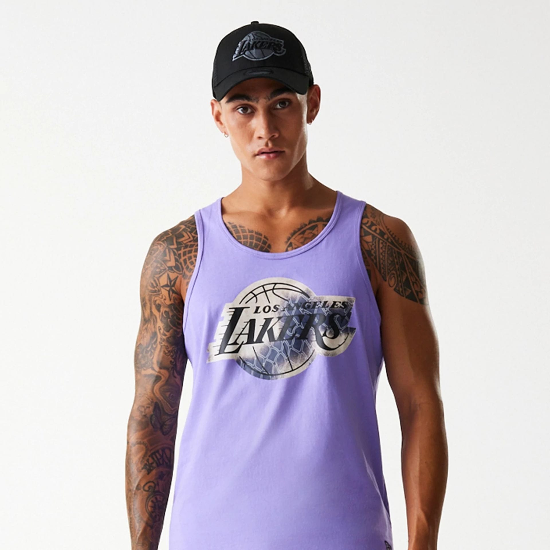 The Male model is wearing LA Lakers NBA All Over Print Infill Purple Vest Top 3
