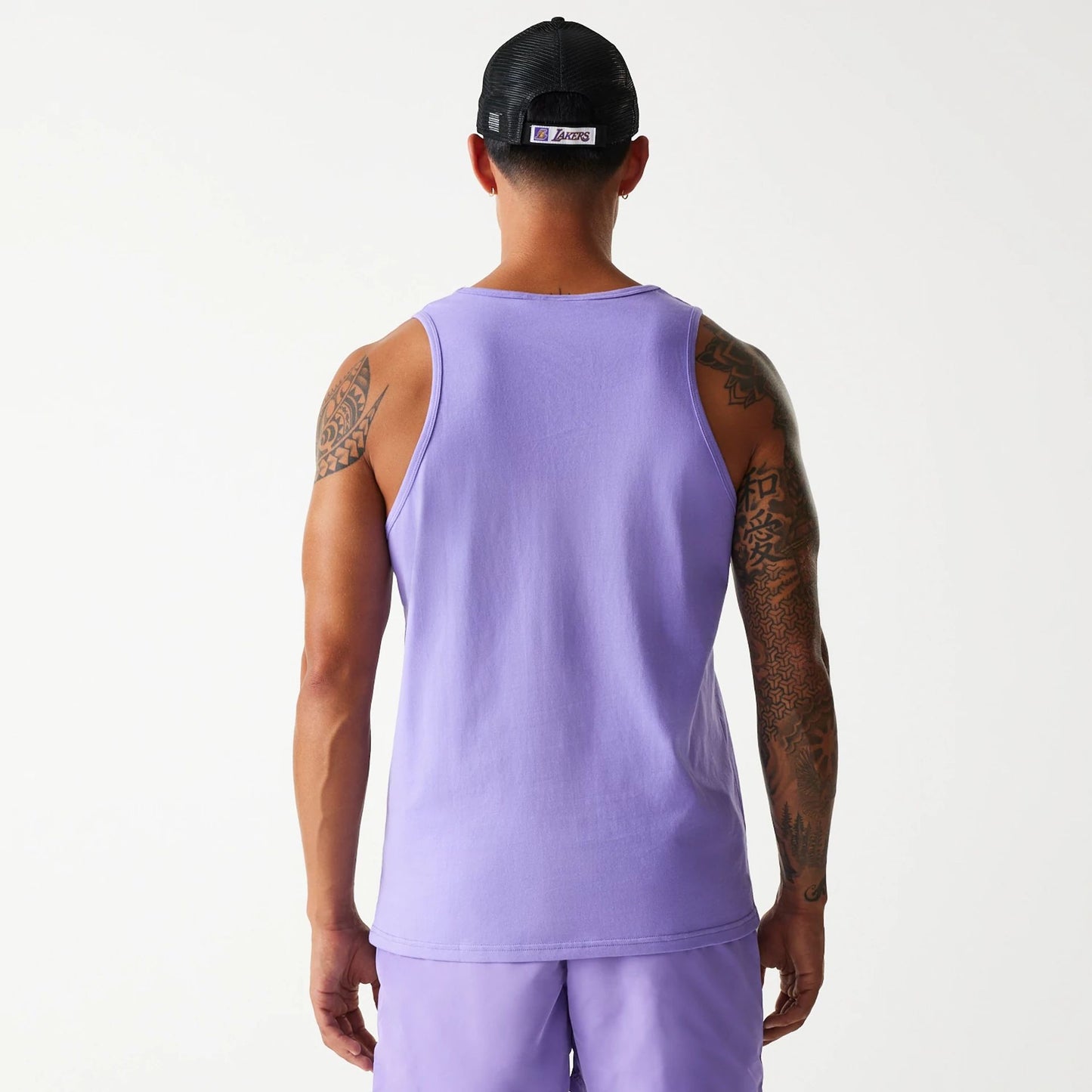 The Male model is wearing LA Lakers NBA All Over Print Infill Purple Vest Top 2