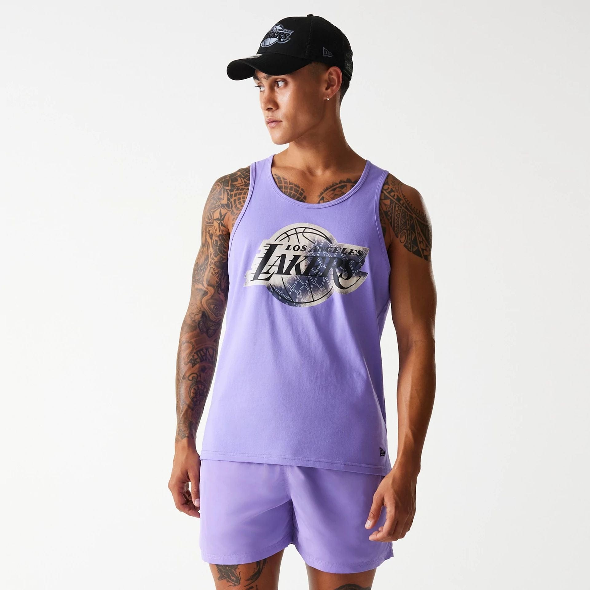 The Male model is wearing LA Lakers NBA All Over Print Infill Purple Vest Top 1