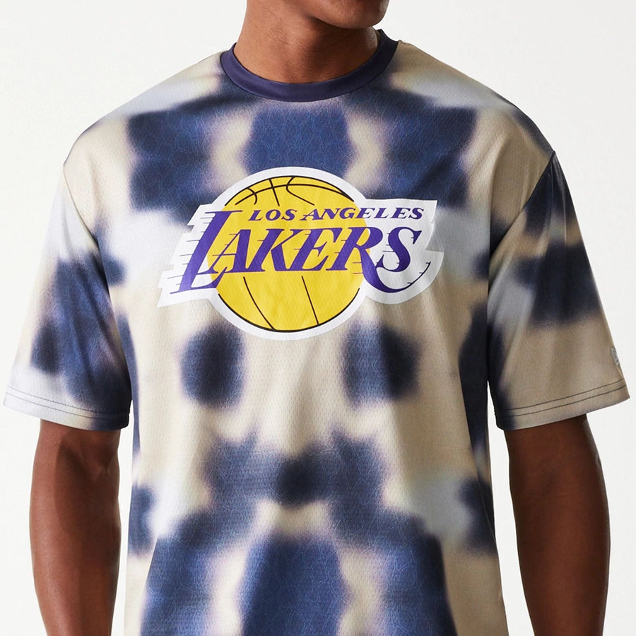 The Male model is wearing LA Lakers NBA All Over Print Cream Oversized T-Shirt 3