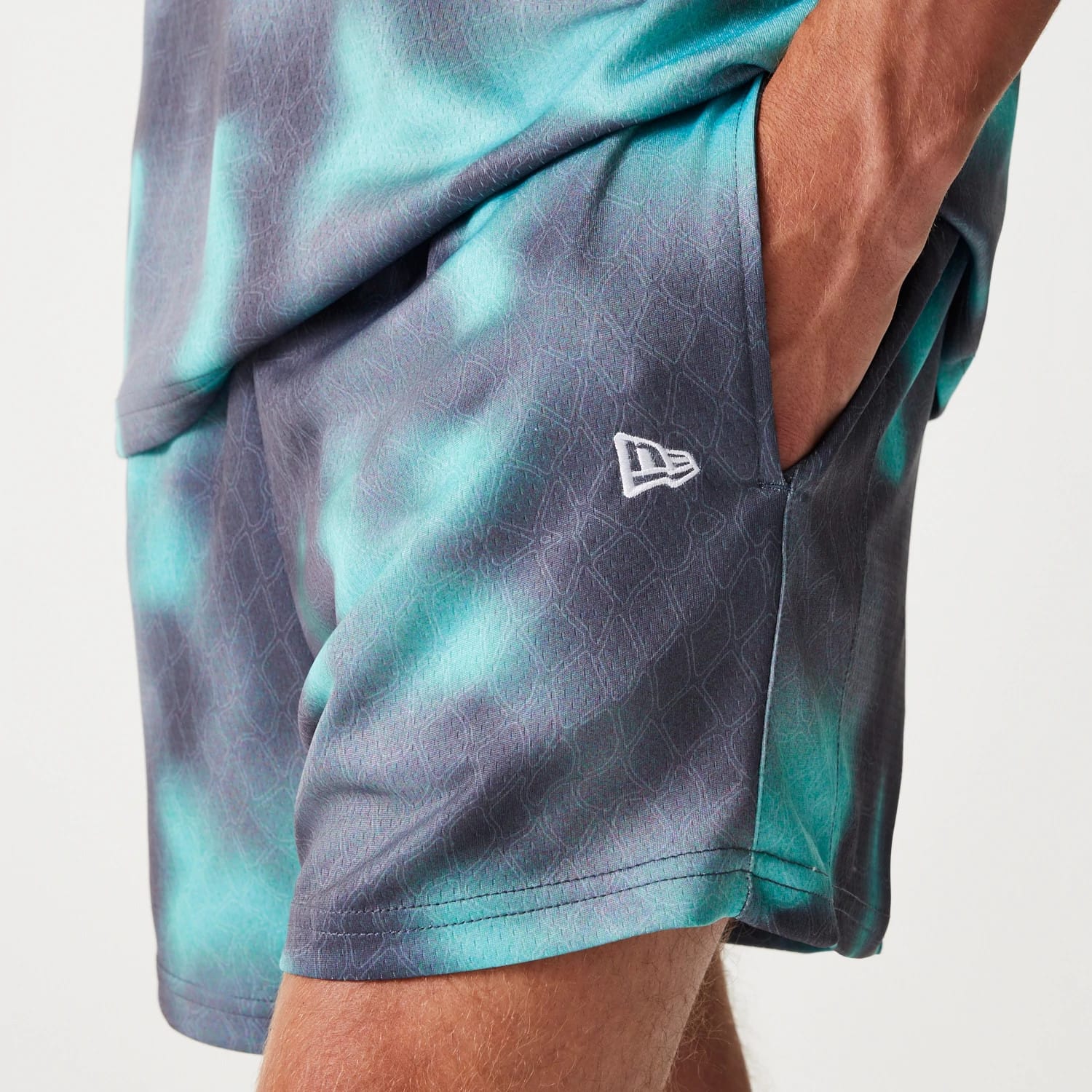 The Male model is wearing Chicago Bulls NBA All Over Print Green Shorts 5