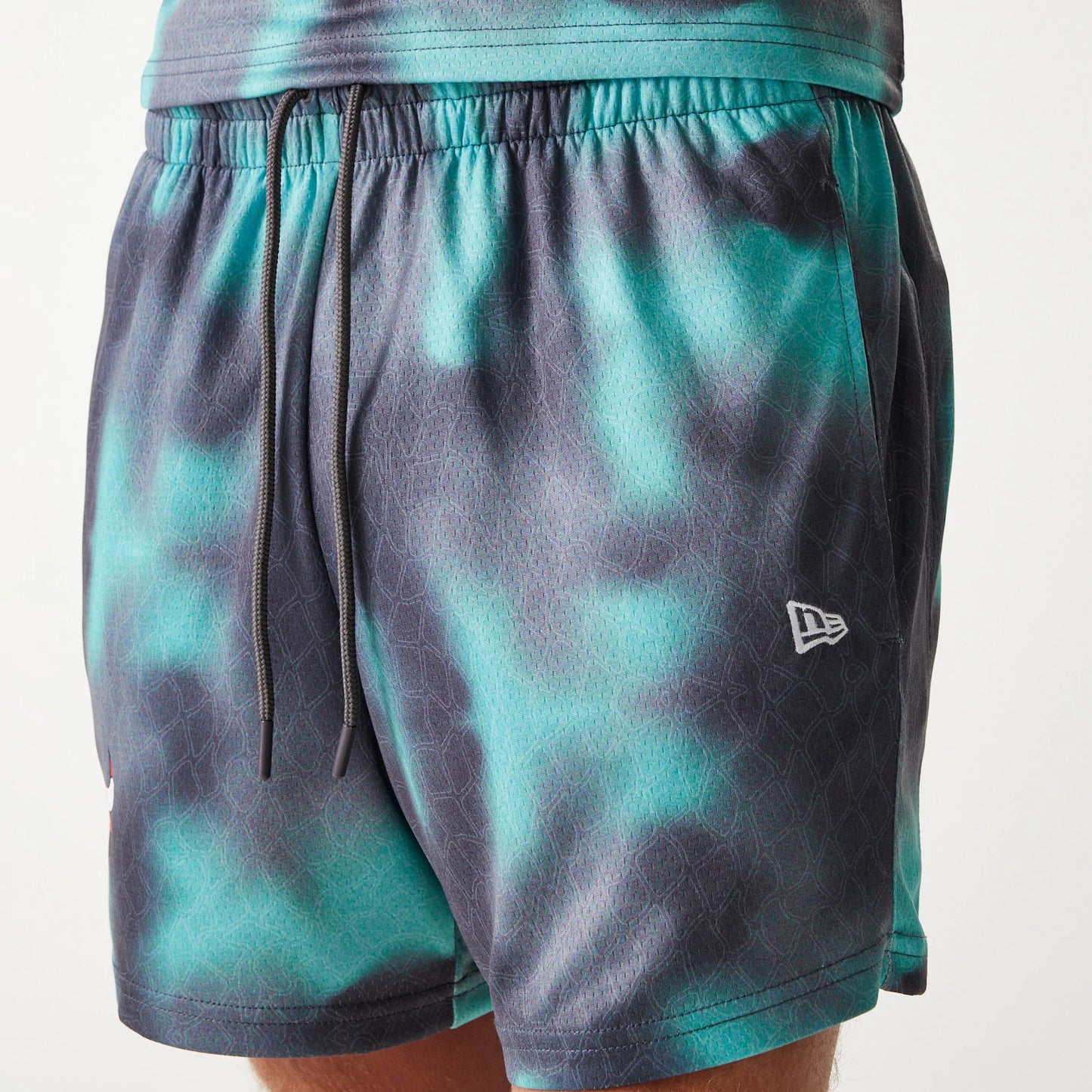 The Male model is wearing Chicago Bulls NBA All Over Print Green Shorts 6