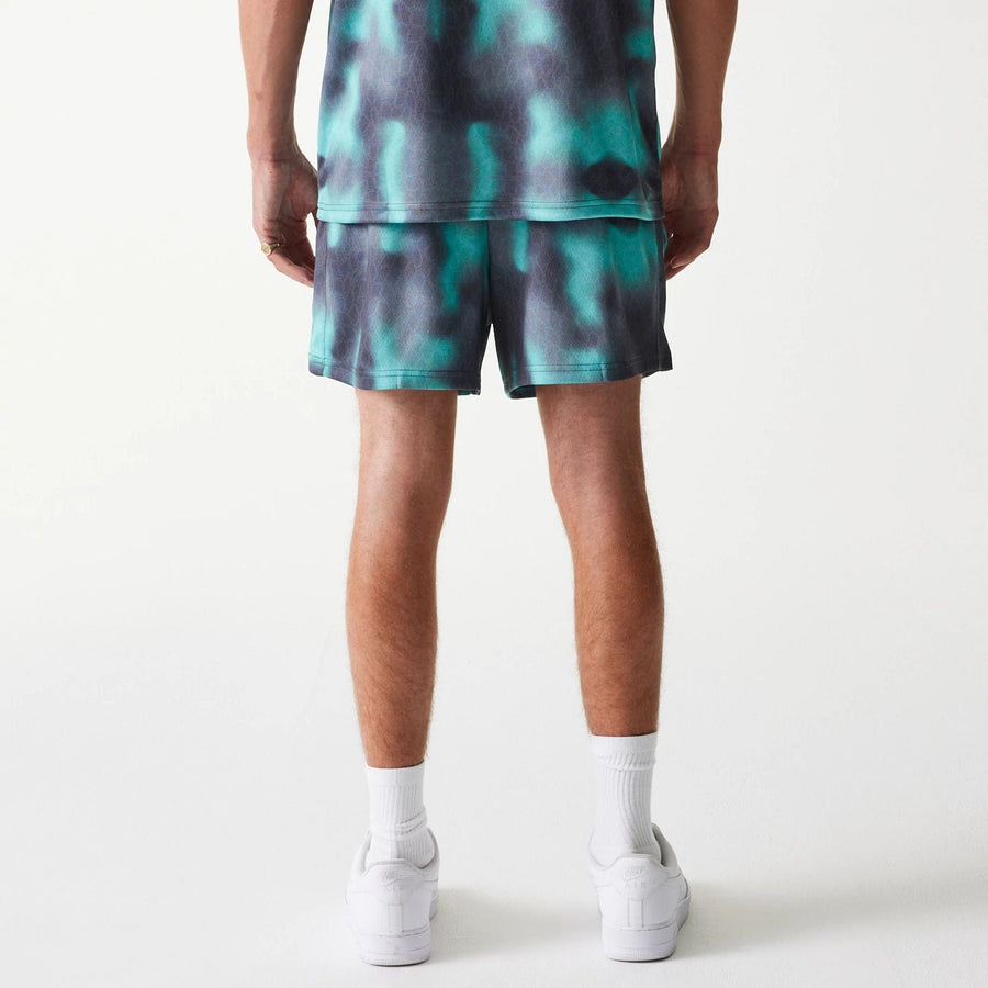 The Male model is wearing Chicago Bulls NBA All Over Print Green Shorts 2