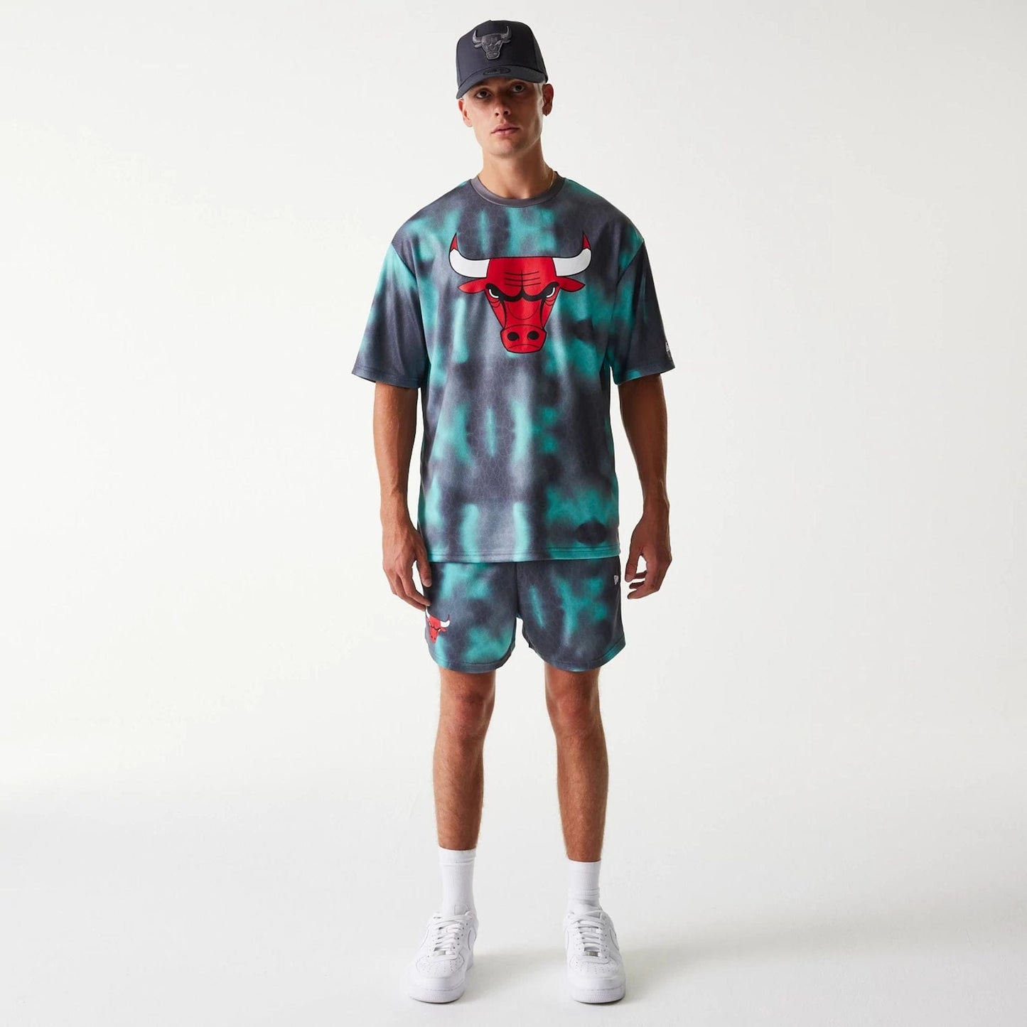 The Male model is wearing Chicago Bulls NBA All Over Print Green Shorts 8