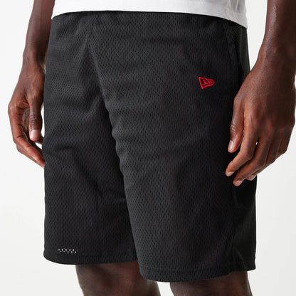 The Male model is wearing New Era Black Mesh Shorts 6