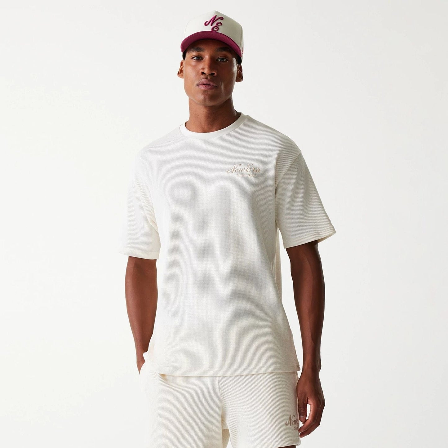 The Male model is wearing New Era Waffle Open White Oversized T-Shirt 3