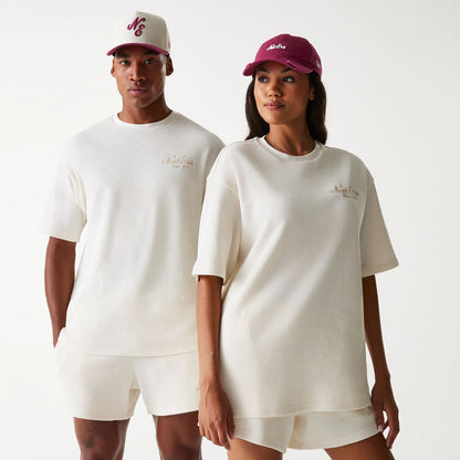 The Male model is wearing New Era Waffle Open White Oversized T-Shirt 1