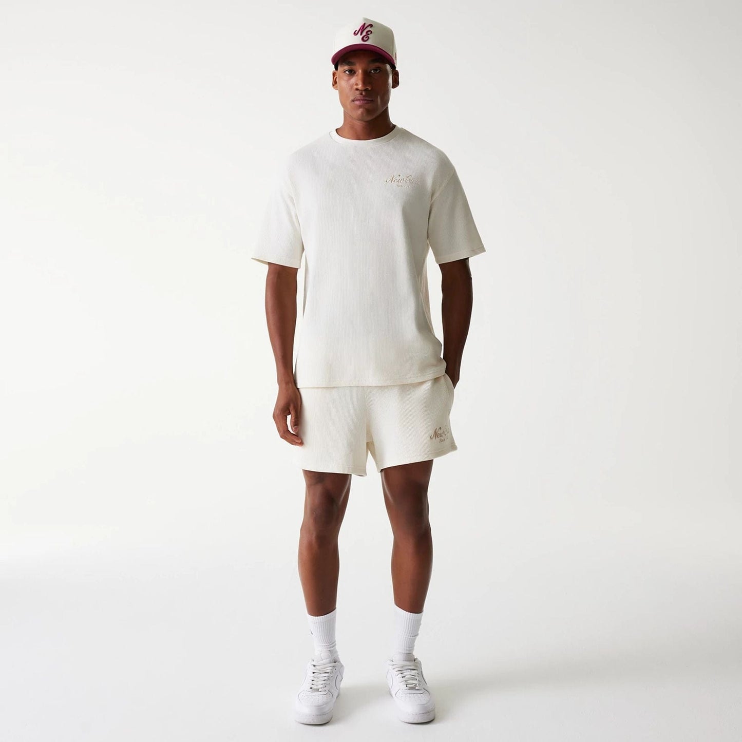 The Male model is wearing New Era Waffle Open White Oversized T-Shirt 7