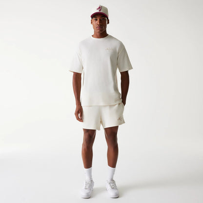 The Male model is wearing New Era Waffle Open White Oversized T-Shirt 7
