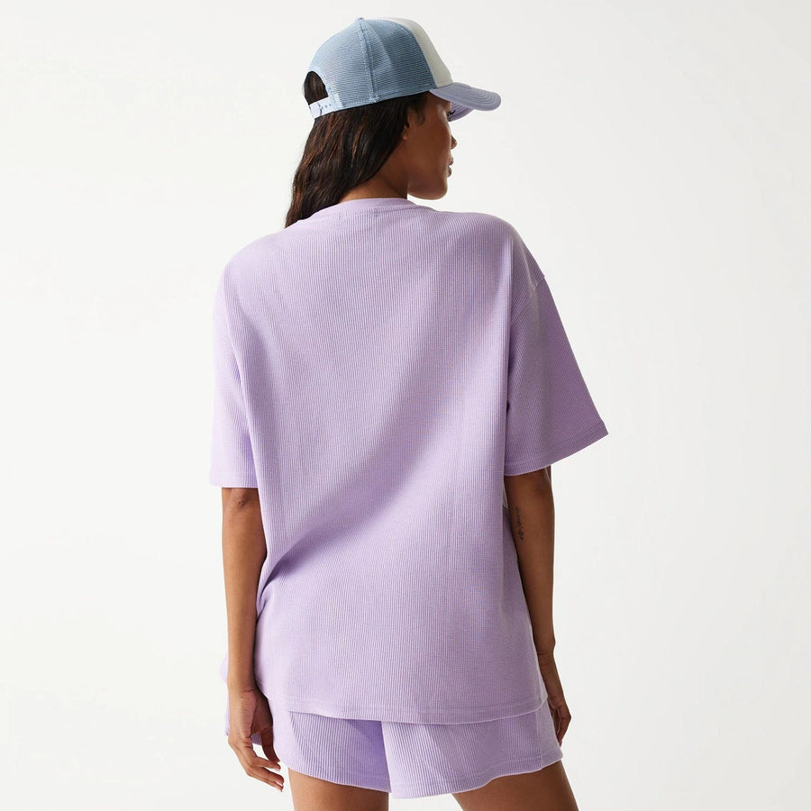 The Male model is wearing New Era Waffle Pastel Purple Oversized T-Shirt 2