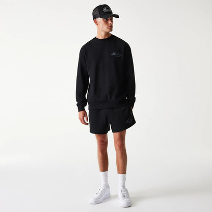 The Male model is wearing New Era Waffle Black Oversized Crew Neck Sweater 7