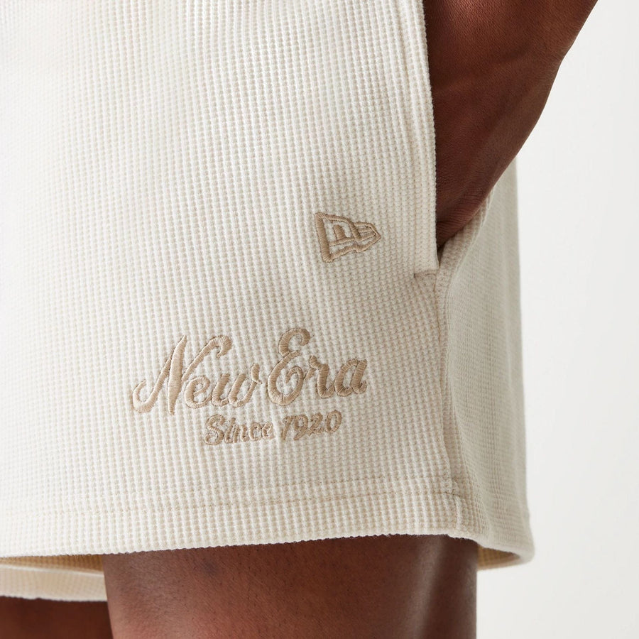 The Male model is wearing New Era Waffle Open White Shorts 4