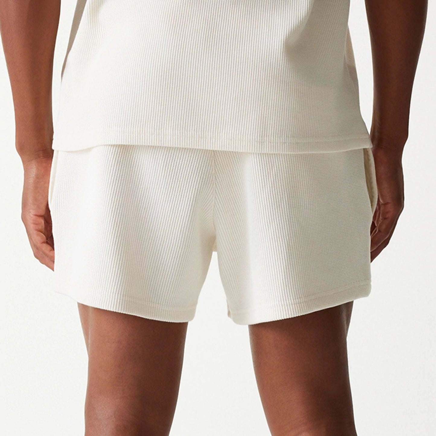 The Male model is wearing New Era Waffle Open White Shorts 7
