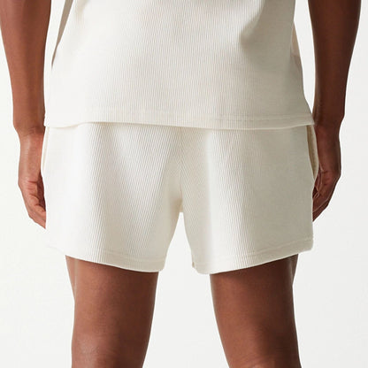 The Male model is wearing New Era Waffle Open White Shorts 7