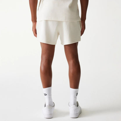 The Male model is wearing New Era Waffle Open White Shorts 2