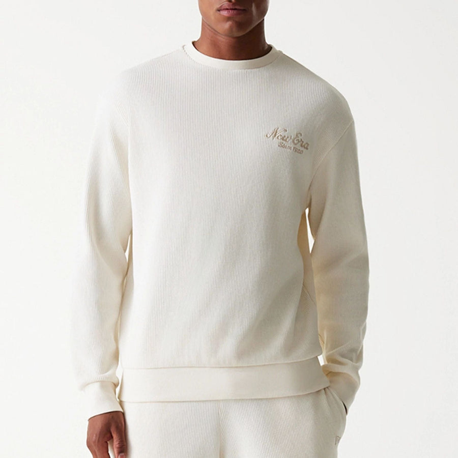 The Male model is wearing New Era Waffle Open White Oversized Crew Neck Sweater 5