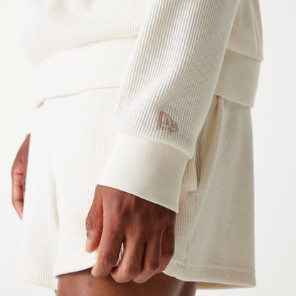 The Male model is wearing New Era Waffle Open White Oversized Crew Neck Sweater 7