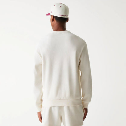 The Male model is wearing New Era Waffle Open White Oversized Crew Neck Sweater 2