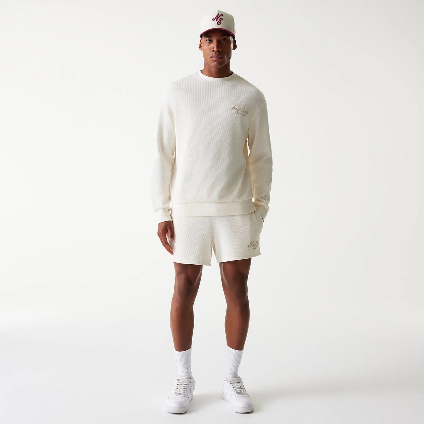 The Male model is wearing New Era Waffle Open White Oversized Crew Neck Sweater 8