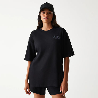 The Male model is wearing New Era Waffle Black Oversized T-Shirt 4