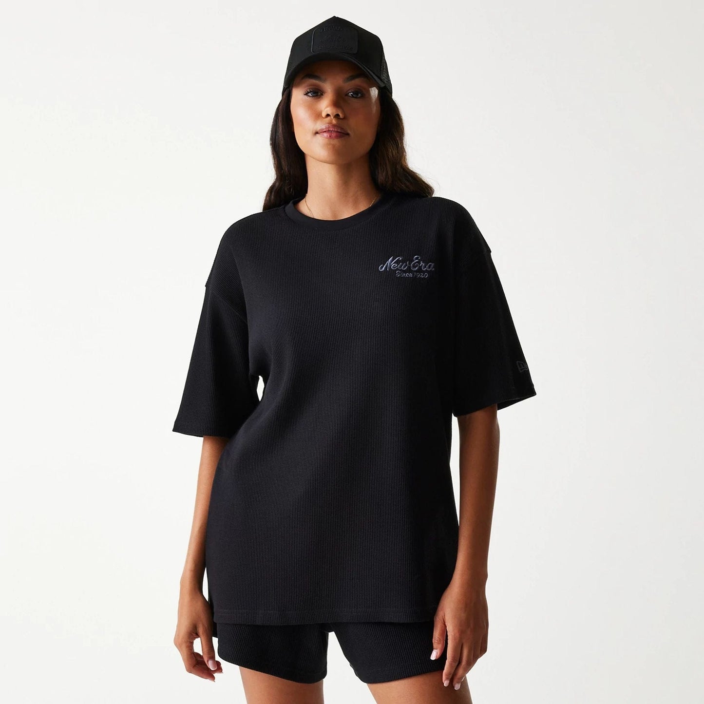The Male model is wearing New Era Waffle Black Oversized T-Shirt 4