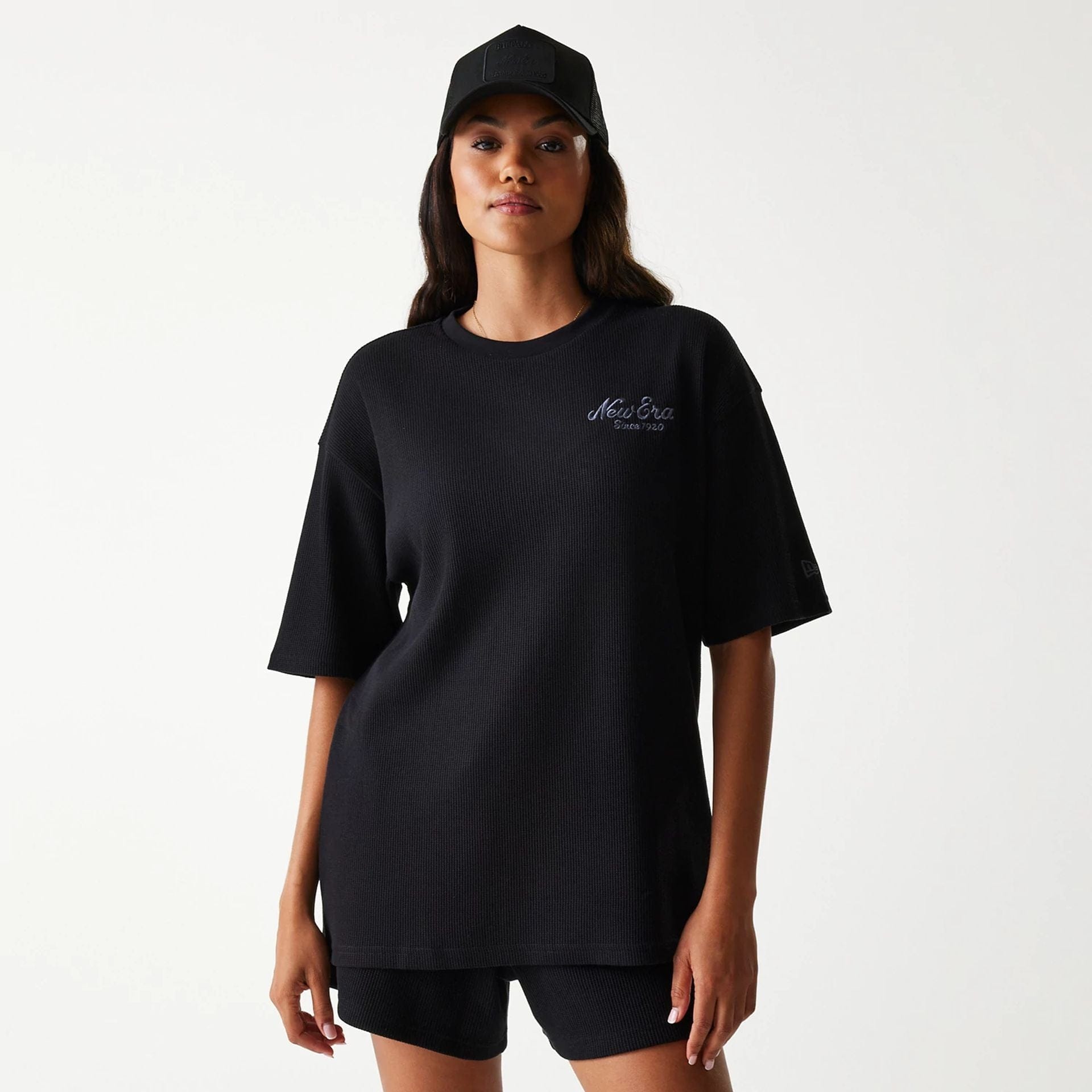 The Male model is wearing New Era Waffle Black Oversized T-Shirt 4