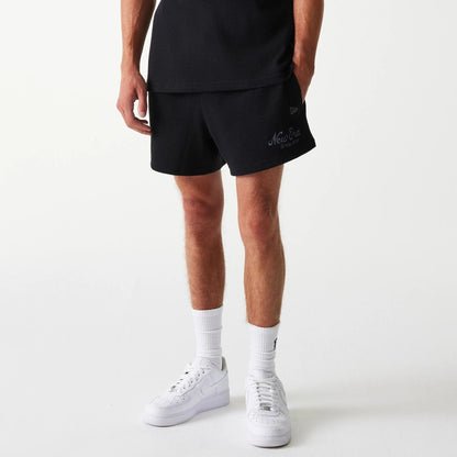 The Male model is wearing New Era Waffle Black Shorts 1