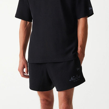 The Male model is wearing New Era Waffle Black Shorts 3