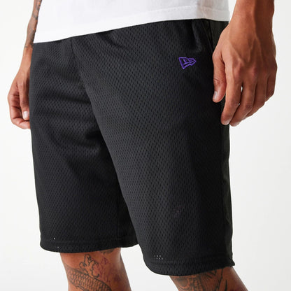 The Male model is wearing New Era Black Mesh Shorts 4