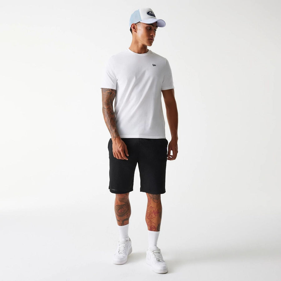 The Male model is wearing New Era Black Mesh Shorts 8