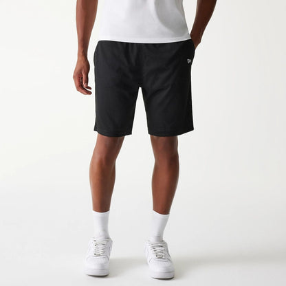 The Male model is wearing New Era Black Mesh Shorts 1