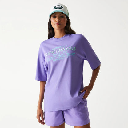 The Male model is wearing New Era Graphic Purple Oversized T-Shirt 5