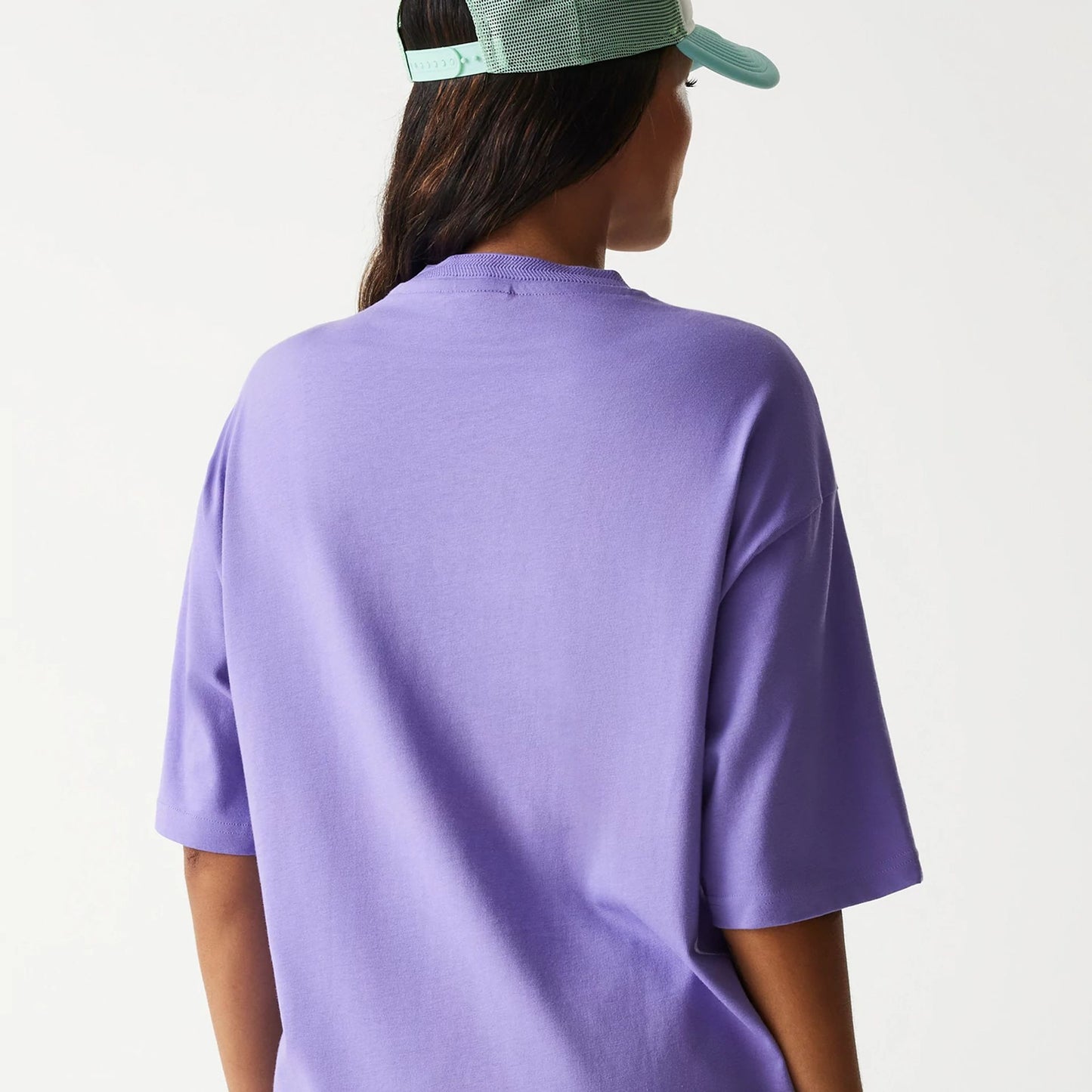 The Male model is wearing New Era Graphic Purple Oversized T-Shirt 4