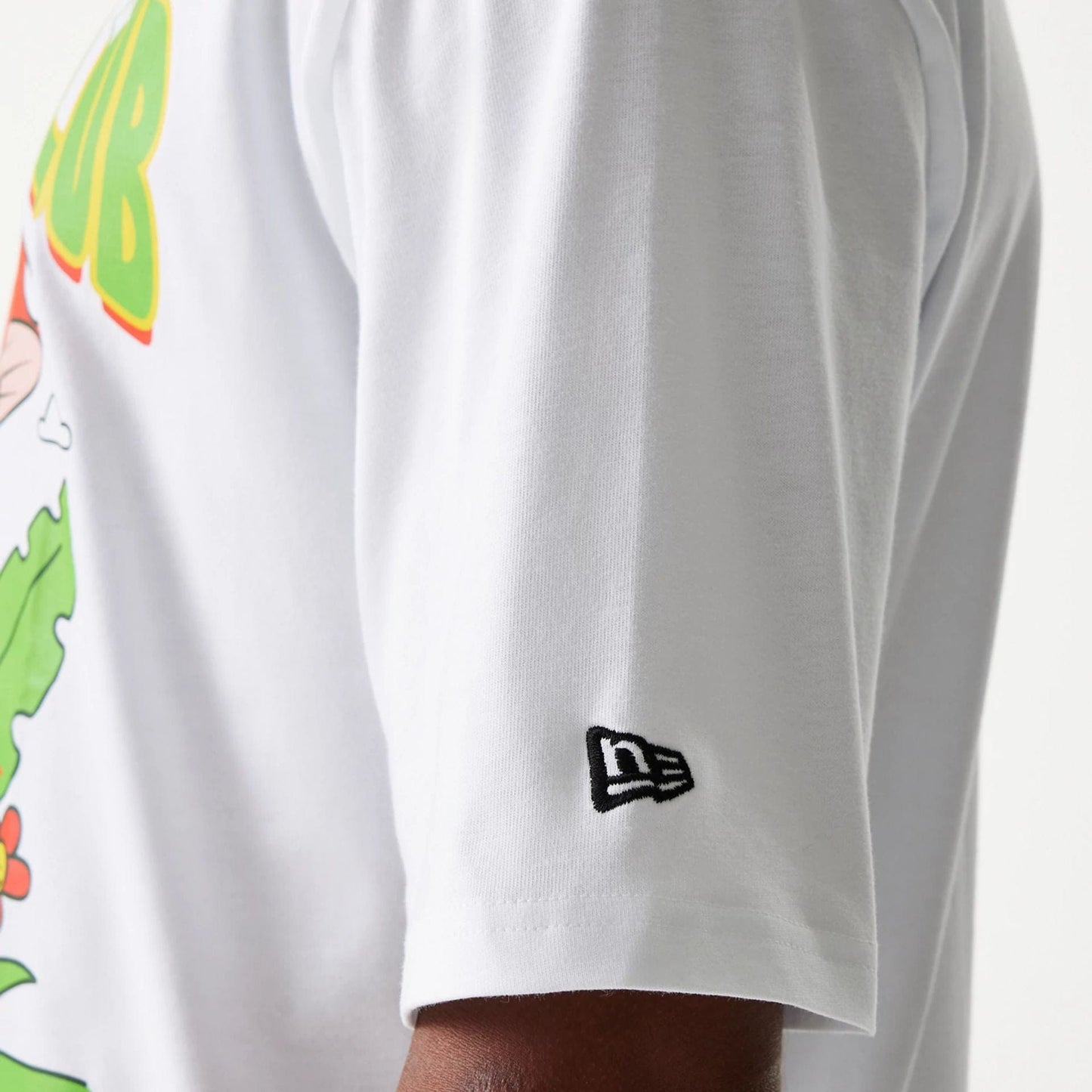 The Male model is wearing New Era Outdoor Graphic White Oversized T-Shirt 7
