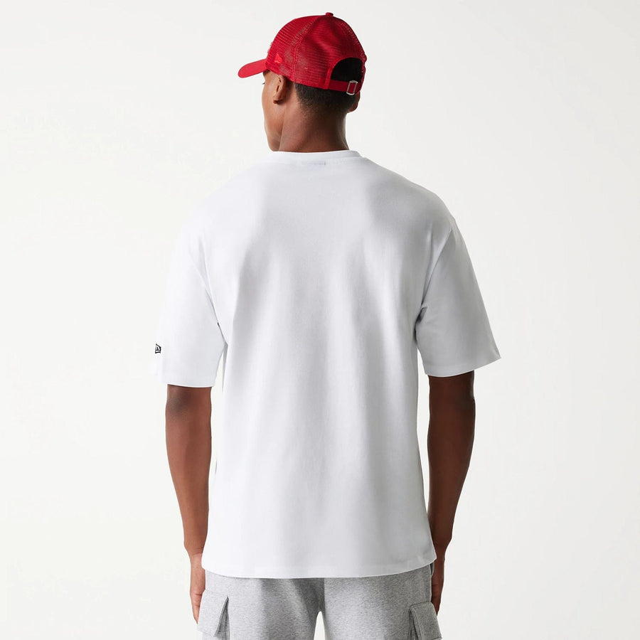 The Male model is wearing New Era Outdoor Graphic White Oversized T-Shirt 2