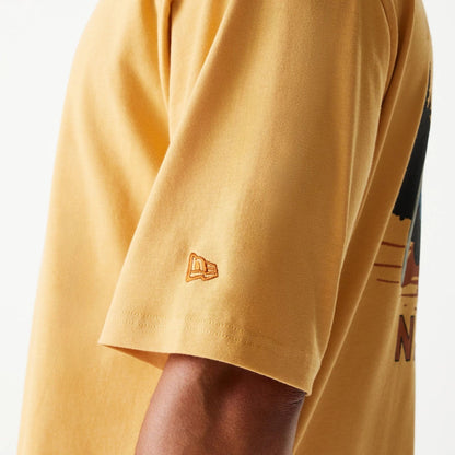 The Male model is wearing New Era Vacation Graphic Beige Oversized T-Shirt 6