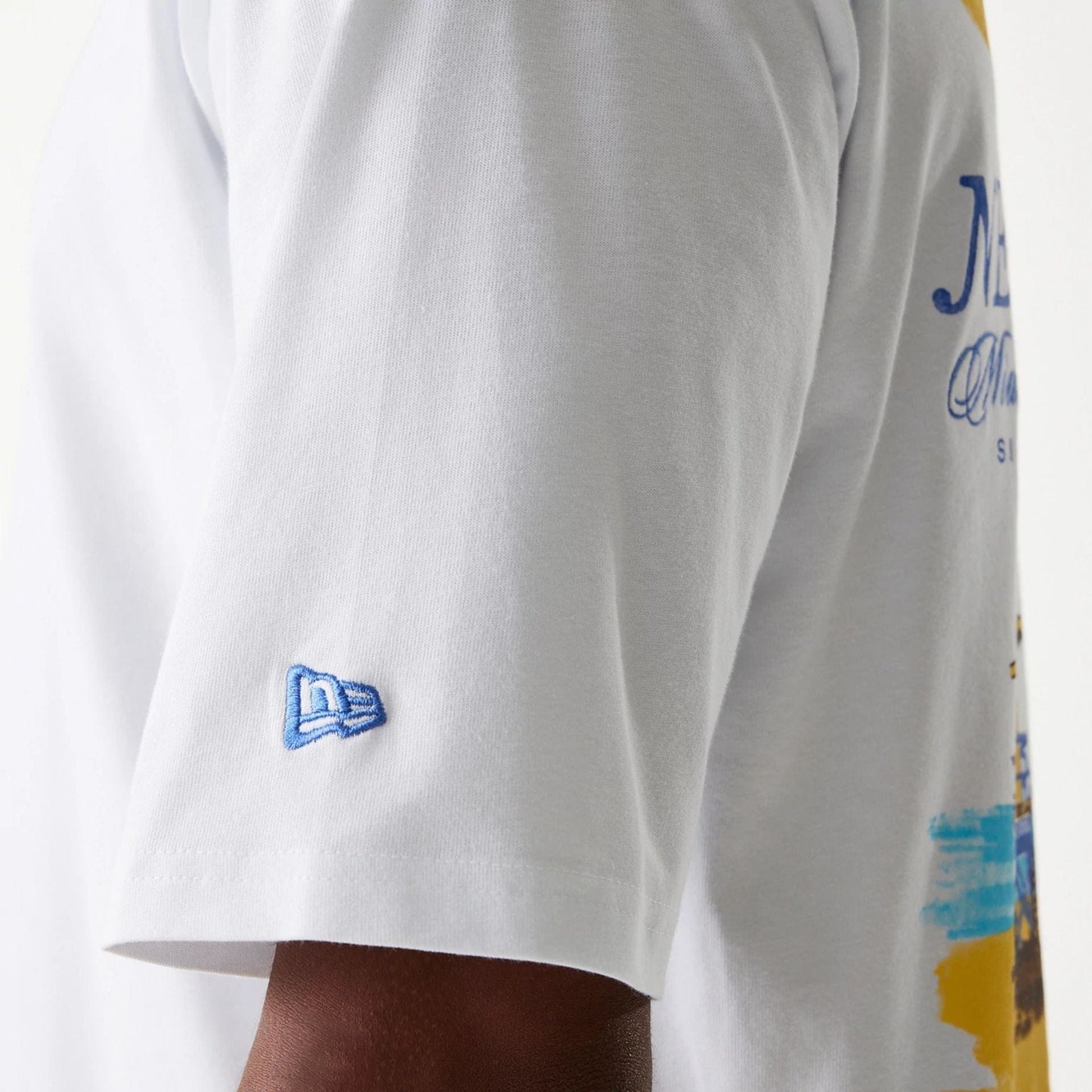 The Male model is wearing New Era Vacation Graphic White Oversized T-Shirt 8