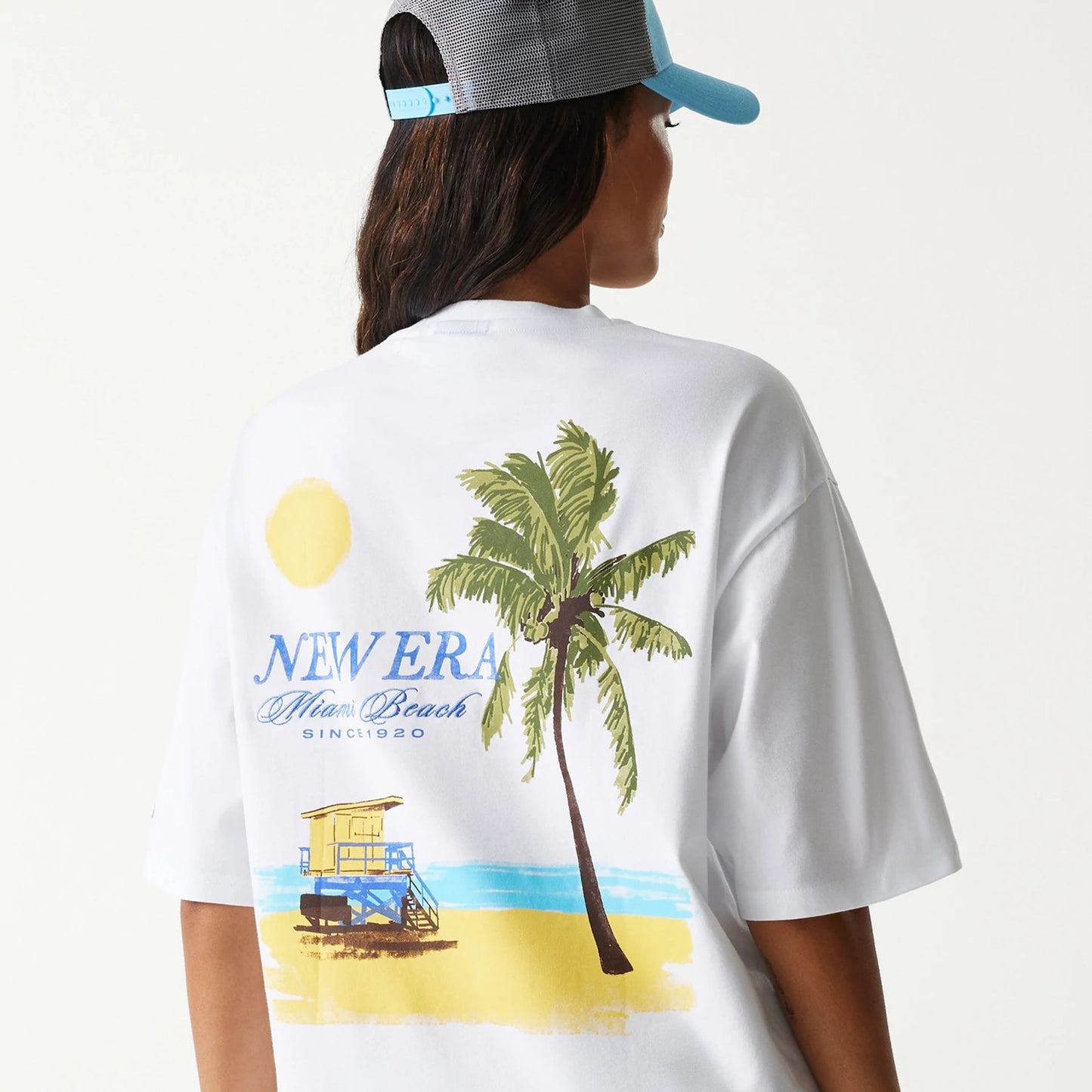 The Male model is wearing New Era Vacation Graphic White Oversized T-Shirt 5