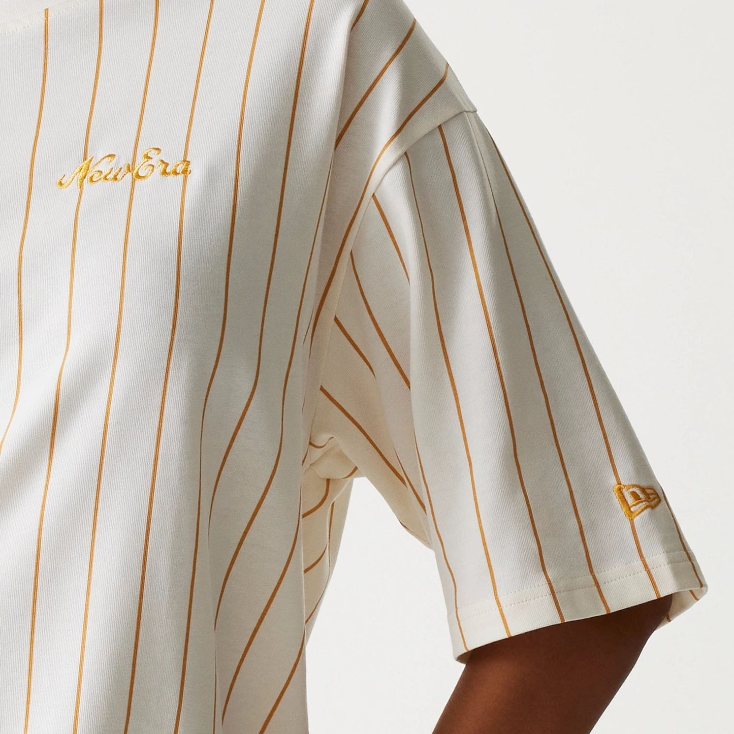 The Male model is wearing New Era Pinstripe Open White Oversized T-Shirt 7