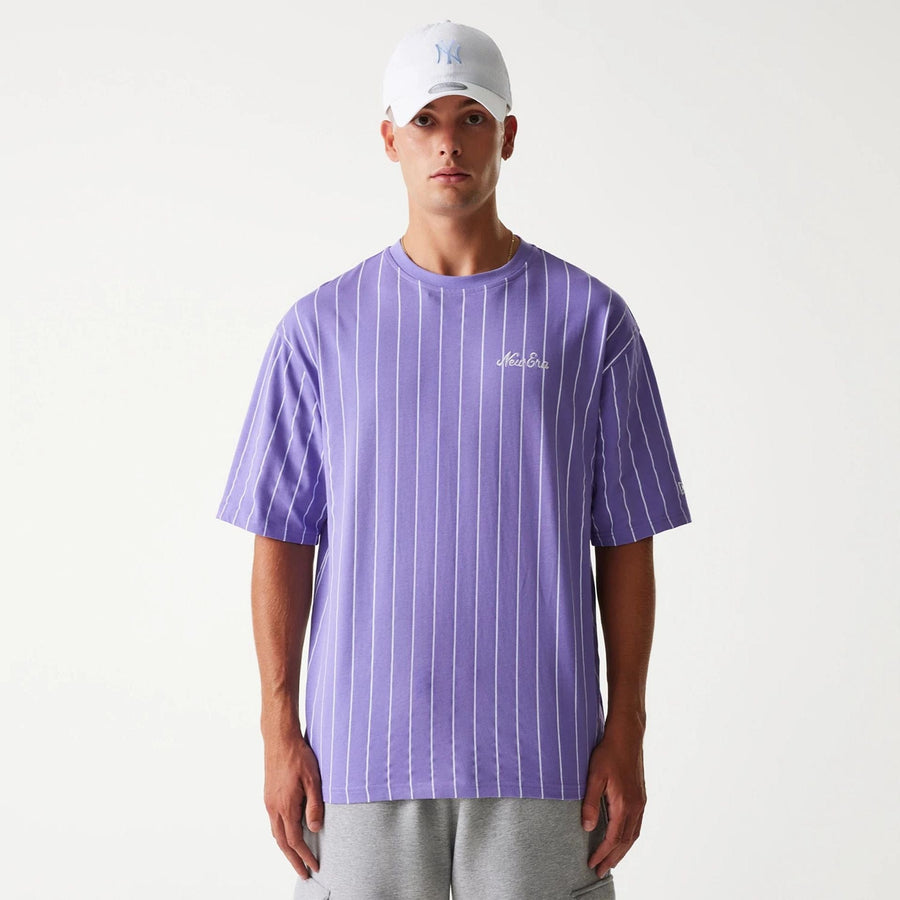 The Male model is wearing New Era Pinstripe Purple Oversized T-Shirt 4