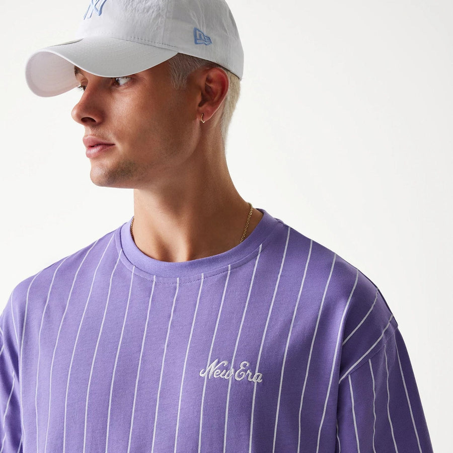 The Male model is wearing New Era Pinstripe Purple Oversized T-Shirt 6